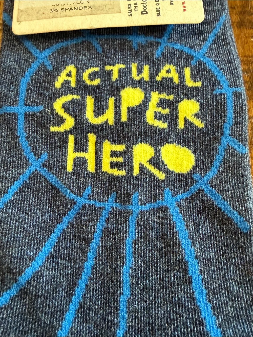 Blue Q Navy Crew Socks with Yellow 'Actual Super Hero' Text
